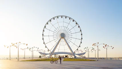 Fotobehang Ferris wheel on the boulevard, Baku city © Vastram