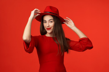 portrait of young woman in red hat