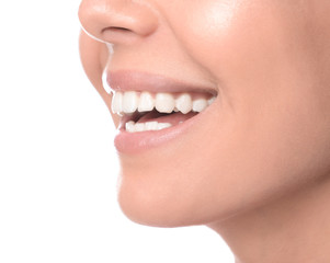 Woman with healthy teeth on white background, closeup