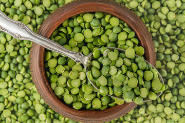 Green Split Peas in a Bowl Close Up Top View. Food Background, Legumes