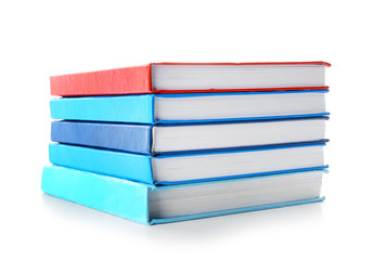 Stack of books on white background