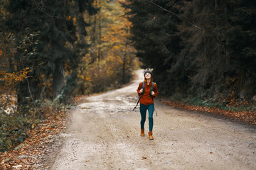 young woman hiking in the forest