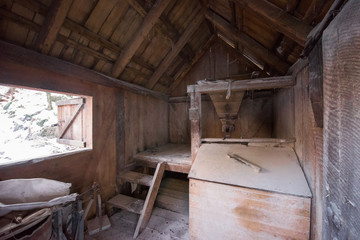 Fototapeta na wymiar interior of retro wooden watermill