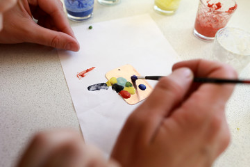 Person learning enamel art