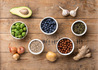 Healthy eating ingredients: fresh vegetables, fruits and superfood. Nutrition, diet, vegan food concept