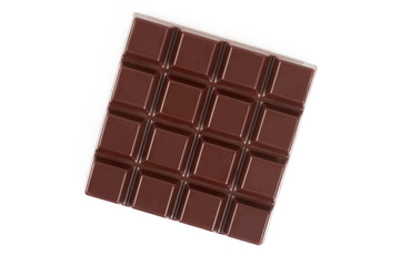 Dark chocolate bar isolated on a white background.