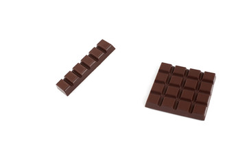 Set with different kinds of chocolate on white background.