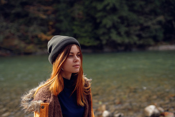 portrait of young woman in autumn park