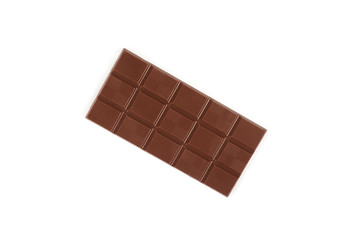 Milk chocolate bar isolated on a white background.