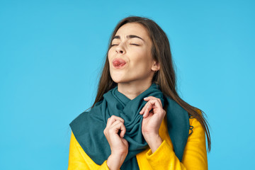 portrait of young woman with thumbs up