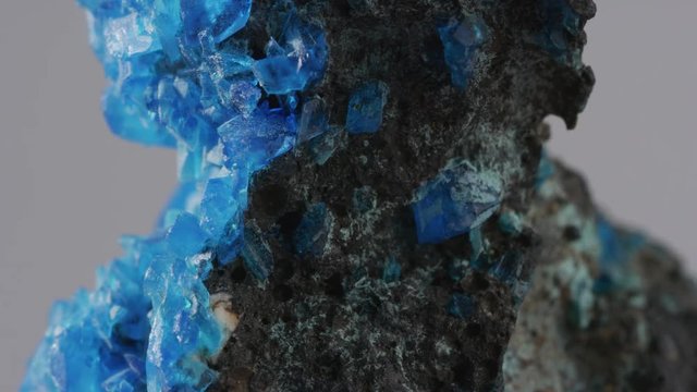 Blue crystals on grey