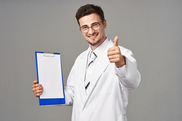 young doctor with business card