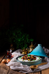 Tajin beef stew with rice paprika and sesame seeds