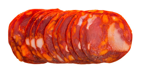 Sliced chorizo sausage on white background, macro