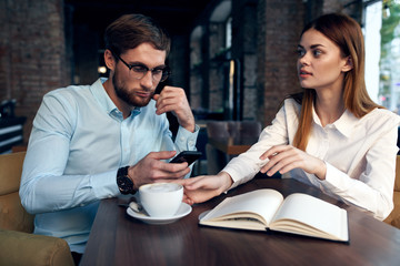 young couple in cafe