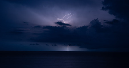 Thunder-storm and lightning in sea