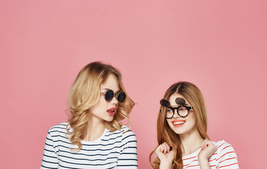 two girls in glasses