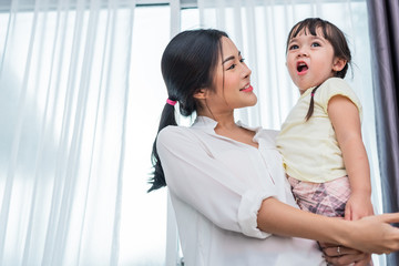 Obraz premium Portrait of Asian mother and cute daughter in bed room. Back to school and Education concept. Children and kids theme. Home sweet home and Nursery theme.