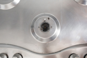 Perfectly clean gas cooker after being washed with polishing chemicals. The result of washing the burners.