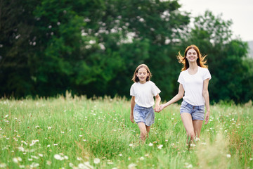 Fototapeta premium mother and daughter in the park
