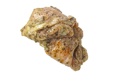 Raw piece of chicken with spice and sauce prepered for barbecue. Gastronomy template isolated on white background.