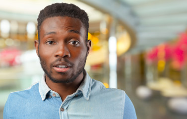 Afro american man desperate in shock. Black businessman in full despair