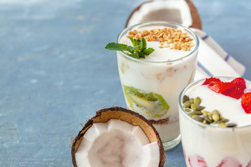 Granola with yogurt and berries for healthy breakfast on a table