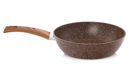Heavy brown frying pan with wooden handle isolated on white background