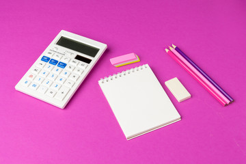 School stationery on a pink background. Back to school creative supplies