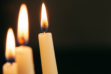 Candle flame close up on a black background