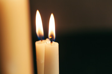 Candle flame close up on a black background