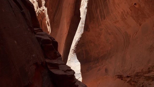 Camera slowly tracks right in the Long Canyon Slot in the Grand Staircase Escalante National Monument.