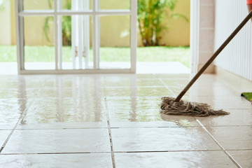 cleaning the floor with mop