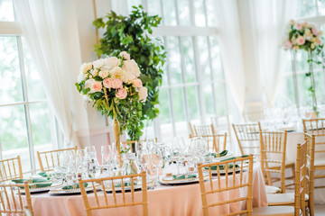 Luxury wedding table decoration. Special event table set up. Fresh flower decoration.