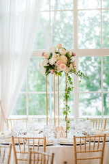 Luxury wedding table decoration. Special event table set up. Fresh flower decoration.