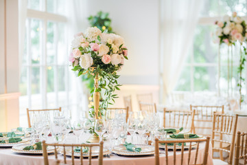 Luxury wedding table decoration. Special event table set up. Fresh flower decoration.