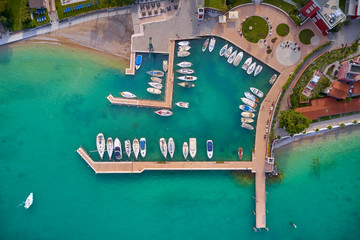 Aerial photography with drone. Boat parking top view.