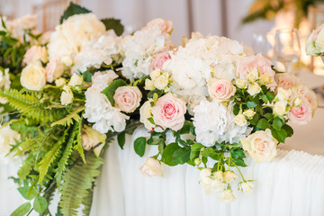 Luxury wedding table decoration. Special event table set up. Fresh flower decoration.