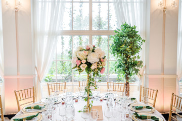 Luxury wedding table decoration. Special event table set up. Fresh flower decoration.