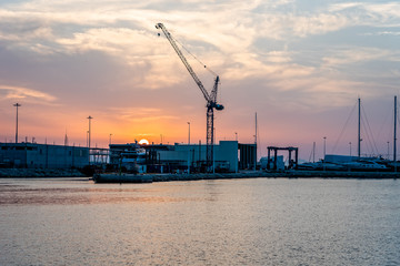 Fototapeta premium Scenic view of a Mediterraenan harbour at sunset
