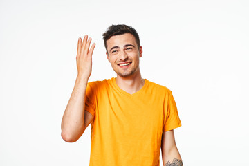 Fototapeta premium young man with arms raised