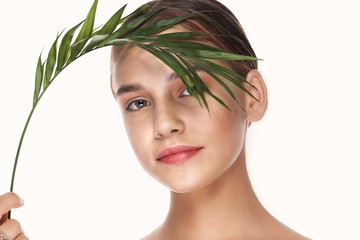 Fototapeta premium portrait of a beautiful woman with perfect skin looking at camera
