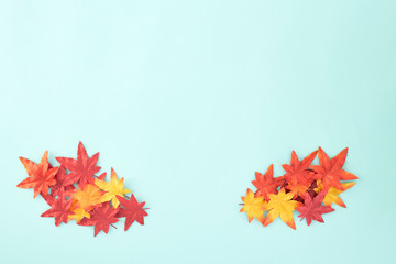 autumn leaves decorative on pale blue