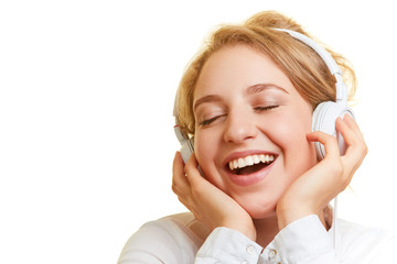 Naklejka premium Woman listening to music on headphones