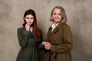 two business women in black coat