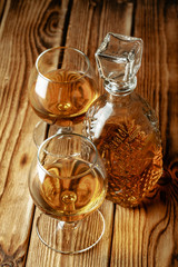 glasses with cognac, whiskey stand on the bar