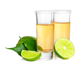 Shot of tequila with a slice of lime no white background