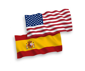 National vector fabric wave flags of Spain and USA isolated on white background. 1 to 2 proportion.