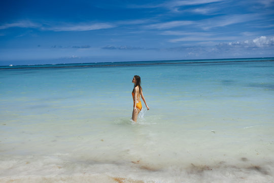 woman walking on the beach