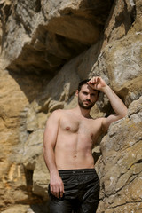 Young sexy man outdoor portrait standing
